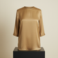 Muted gold silk blouse